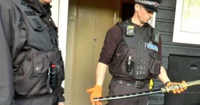 Police raid Maidstone flat.